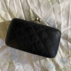 Minimalist black lock purse